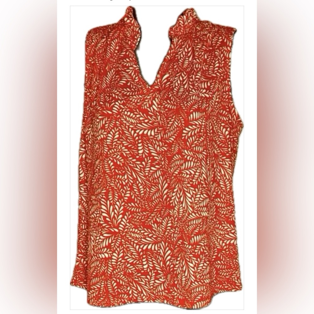 Women’s sleeveless blouse/ slightly ruffled collar. Orange/white tropical.Size S